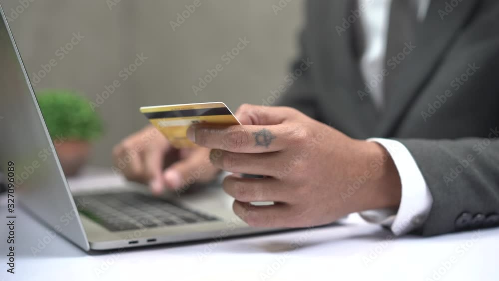 Businessman payment place an order by credit card Businessman payment place an order by credit card