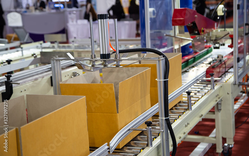 Production line of carton packing and sealing machine photo
