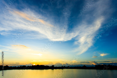 colorful dramatic sky with cloud at sunset