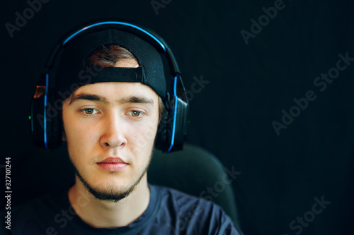 Cyber sport. Close-up of the face of a professional gamer involved in gameplay.