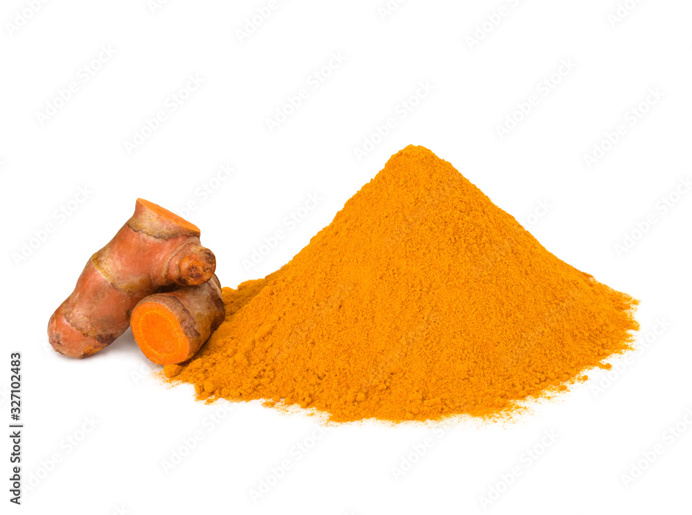 Turmeric (curcumin) powder and rhizomes isolate on a white background,Used for cooking and as herbal medicine,copy space. Turmeric (curcumin) powder and rhizomes isolate on a white background,Used for cooking and as herbal medicine,copy space.