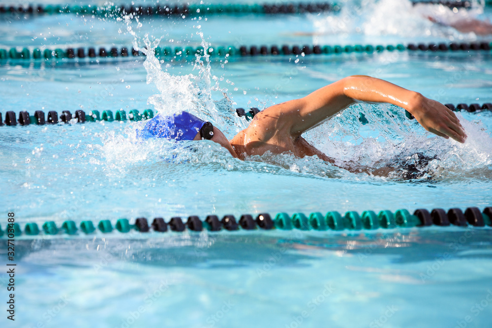 Freestyle swimmer in a race