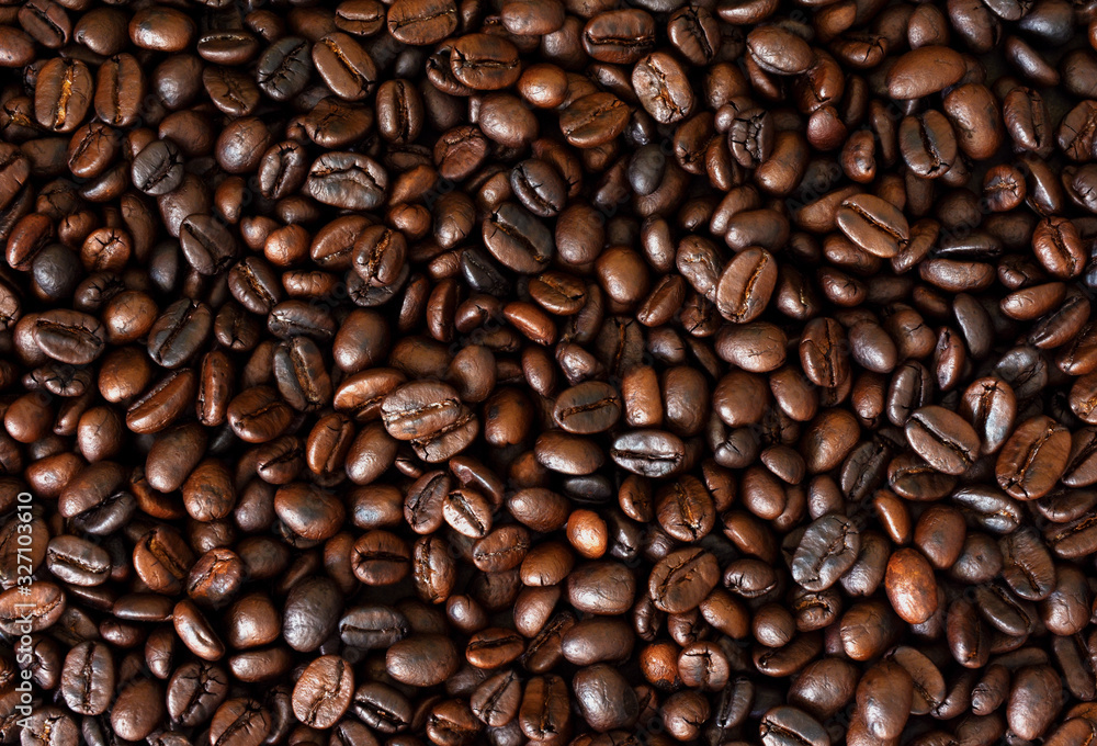 Roasted coffee beans,Coffee bean background,Dark Roasted Coffee,top view. Roasted coffee beans,Coffee bean background,Dark Roasted Coffee,top view.
