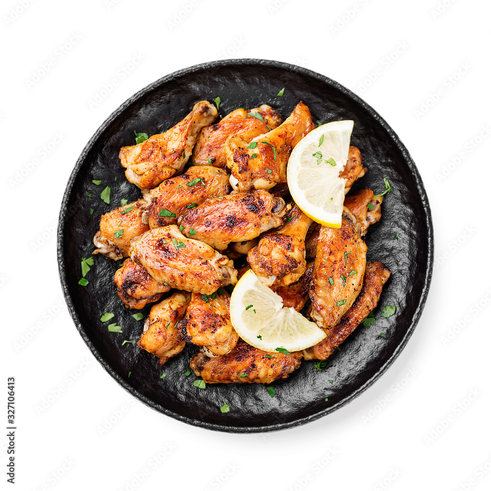 Fototapeta premium Baked chicken wings served with different sauces and lemon. isolated on white background