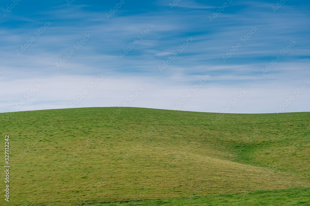 Blue sky and green grass hill landscape photo background. Blue sky and green grass hill landscape photo background.