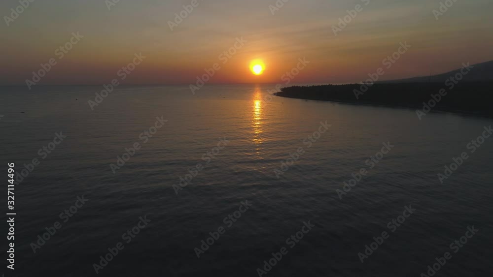 aerial view sunrise over ocean. seascape colorful sunrise over sea at tropical resort aerial view sunrise over ocean. seascape colorful sunrise over sea at tropical resort