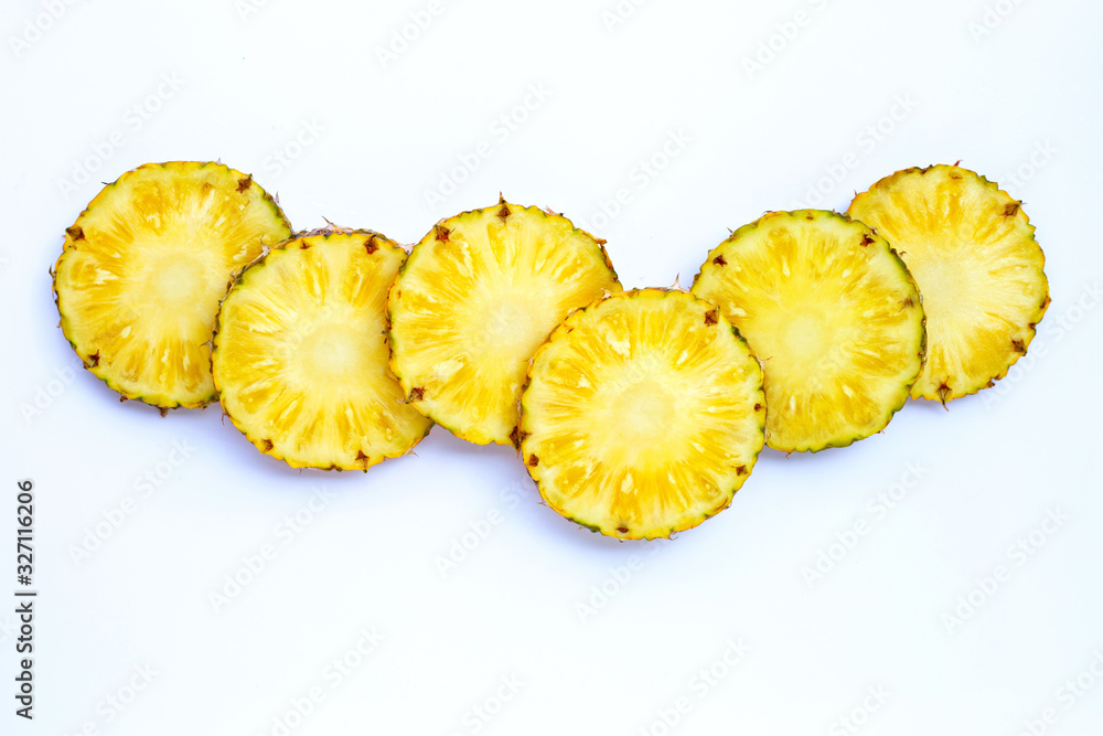 Fresh pineapple slices on white background. Fresh pineapple slices on white background.