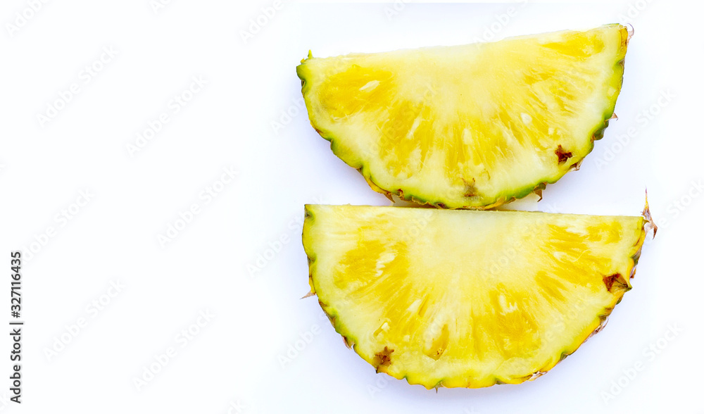 Fresh pineapple slices on white background. Fresh pineapple slices on white background.