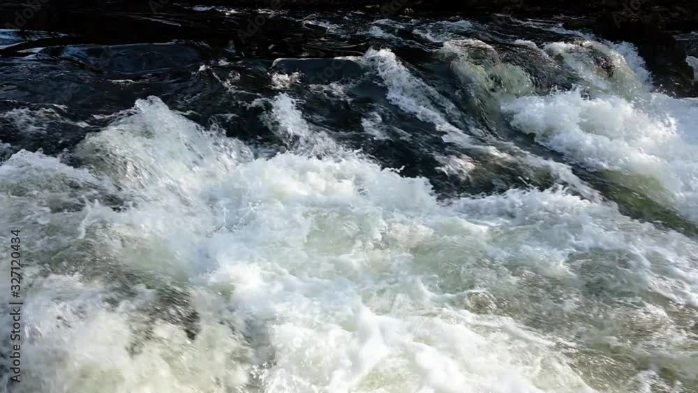 Mountain river running through the rocky canyon Mountain river running through the rocky canyon