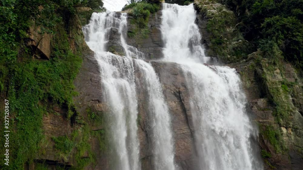 4k panning video of beautiful waterfall in mountains at tropical asian island 4k panning video of beautiful waterfall in mountains at tropical asian island