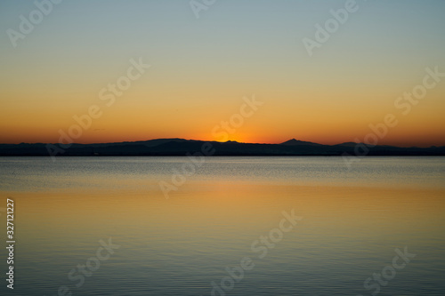 orange sunset on a lake 