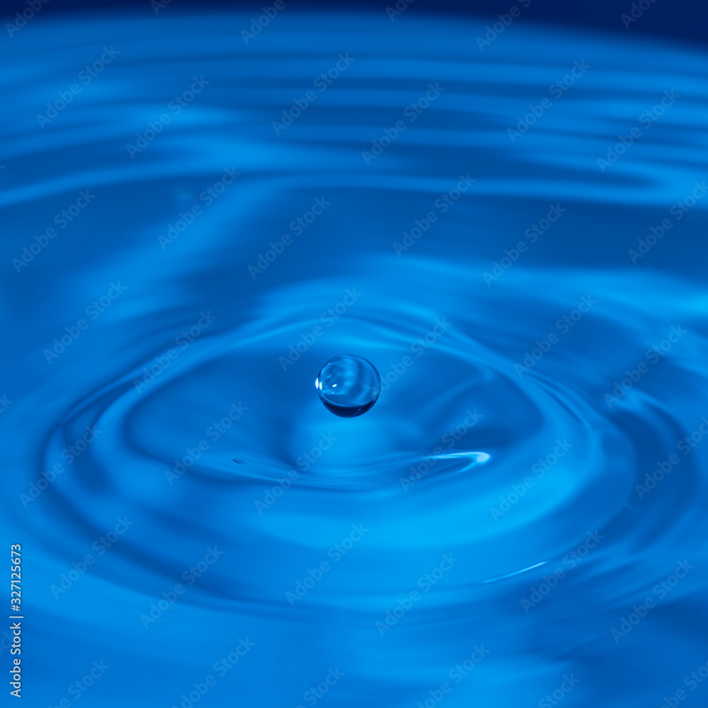 water drop bouncing on the surface of more water water drop bouncing on the surface of more water