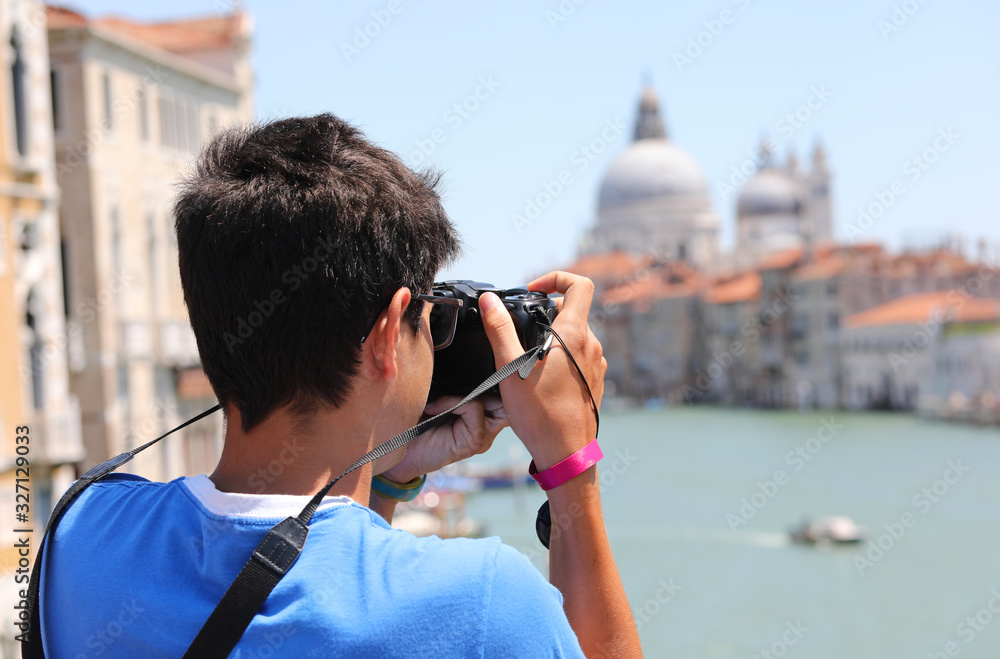 Young photographer in Venice in Italy