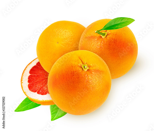 Grapefruit with slice and leaf on white background