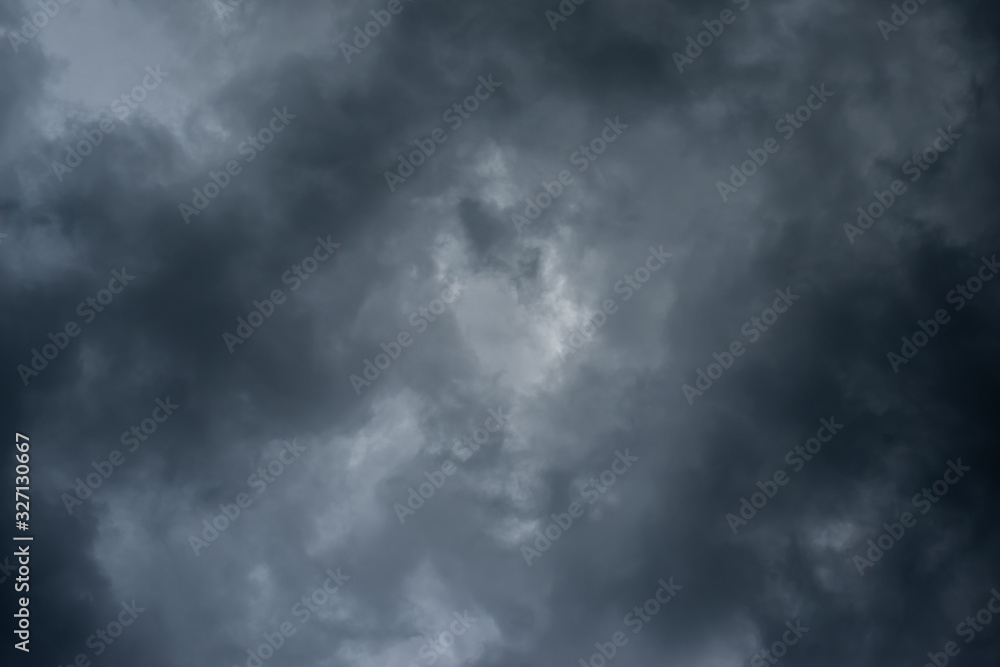 Dark black clouds in the sky, Stormy rain clouds background. Dark black clouds in the sky, Stormy rain clouds background.