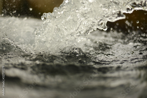 Running tubewell fresh water in fields during summer © shaadjutt36