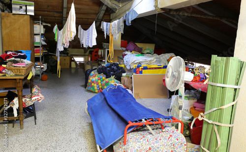 Canvas-taulu attic with many furniture