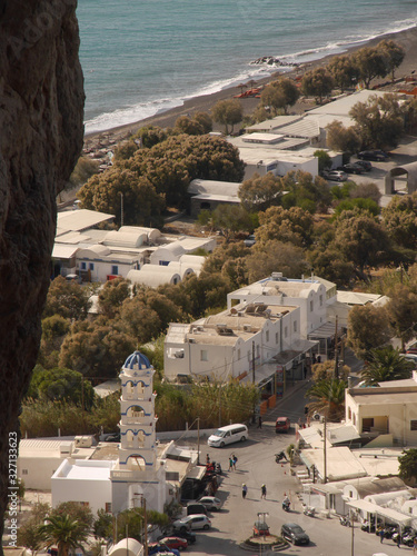 Panoramic view of the village of Perissa on Santorini island, from the top of the mountain. Aerial view of the Mediterranean Sea and beaches.