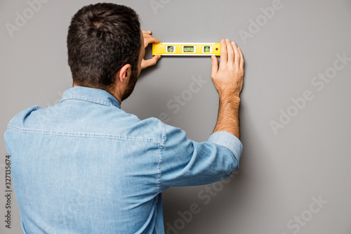 Man working with spint level stock photo photo