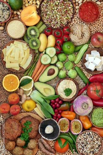 Fototapeta Naklejka Na Ścianę i Meble -  Large vegan health food collection with foods high in protein, antioxidants, vitamins, anthocyanins, minerals dietary fibre & smart carbs. Flat lay, top view. Healthy food concept.