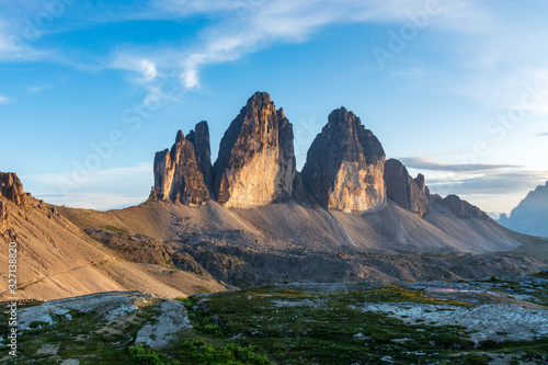 Famous mountains Three Peaks in the Dolomites during sunset