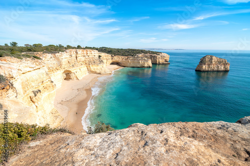 high cliffs on the shore of the Atlantic Ocean. Portugal. Algarve.