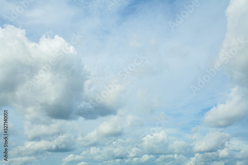 Fototapeta Naklejka Na Ścianę i Meble -  Fluffy Clouds In Blue Sky. Background From Clouds.