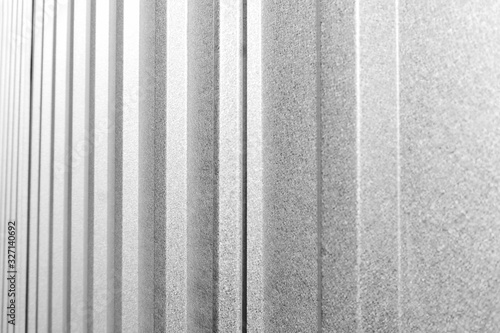 Corrugated metal, zinc texture surface, galvanize steel in the vertical line texture in black and white toning