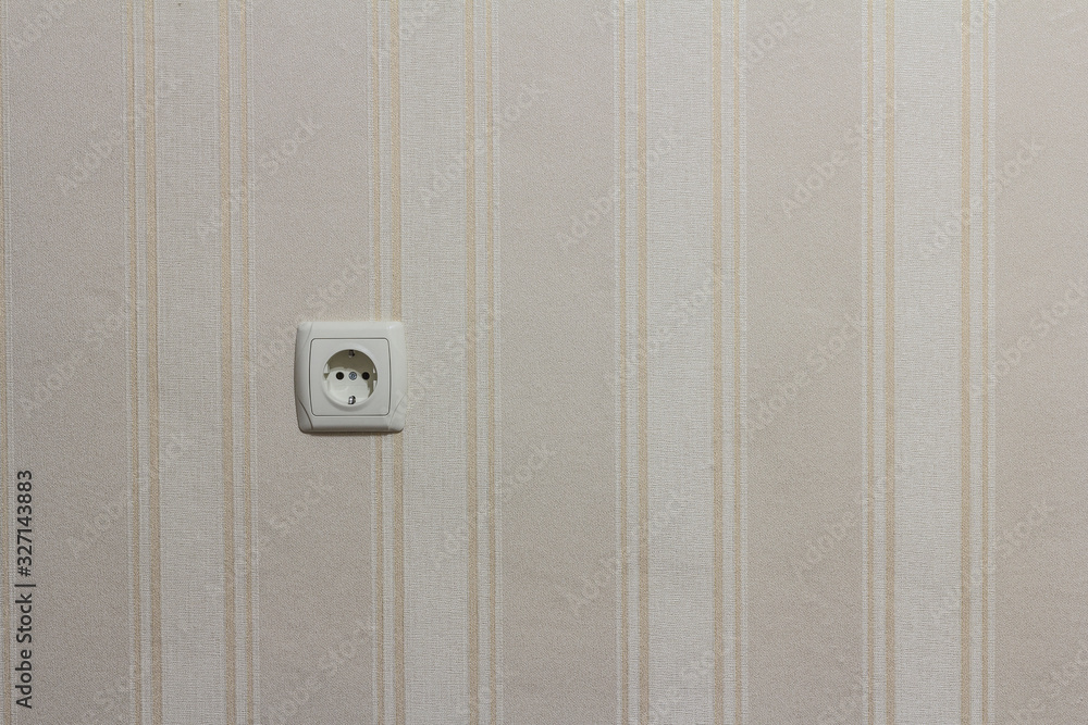 White sockets against a white wall White sockets against a white wall