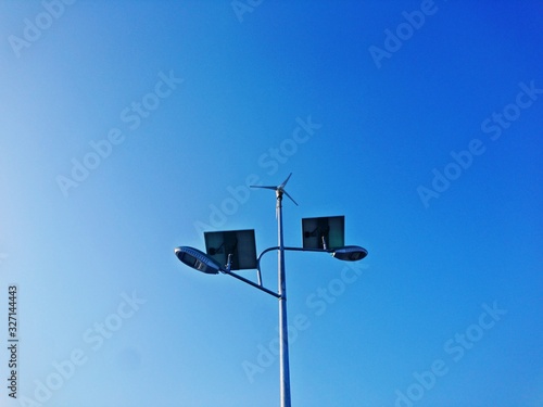 Wind power and solar power for use with street lighting