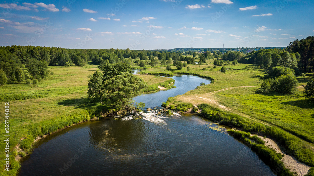 Field and river Usherka near Sudogda in summer, shooting from a quadcopter. Russia, Vladimir region