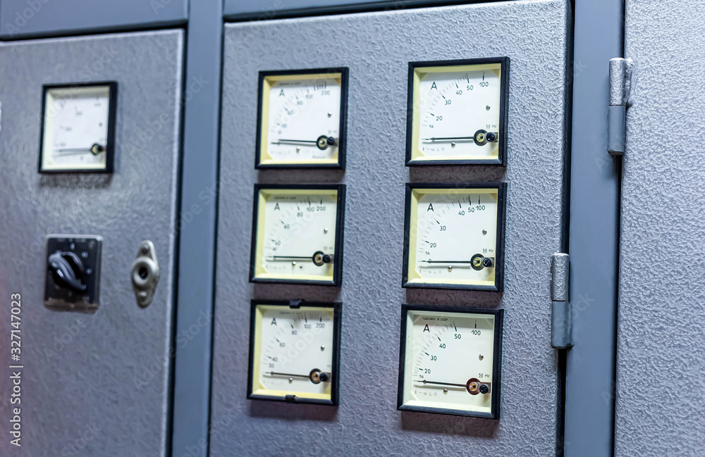 Ammeter wall, amperemeters, lots of simple square industrial gauges