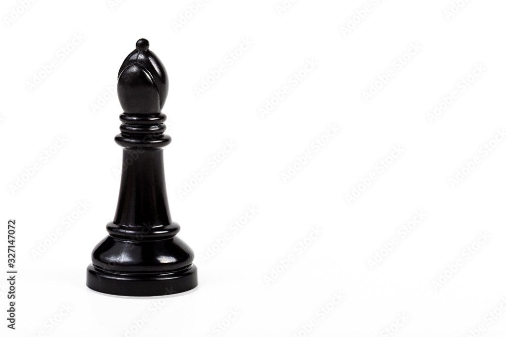 Simple one single shiny black bishop chess piece figure alone, isolated on white background, object cut out, big game piece chess set element, simplicity, closeup, copy space on right side Simple one single shiny black bishop chess piece figure alone, isolated on white background, object cut out, big game piece chess set element, simplicity, closeup, copy space on right side