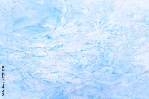 Simple abstract icy light blue white cloud-like dreamy ethereal background texture. Crumpled creased watery blue paper artsy diy clouds structure backdrop winter cold frost wallpaper design