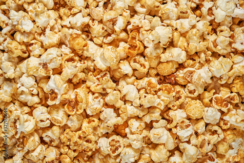 Background of popcorn flakes. Popcorn flakes close-up.