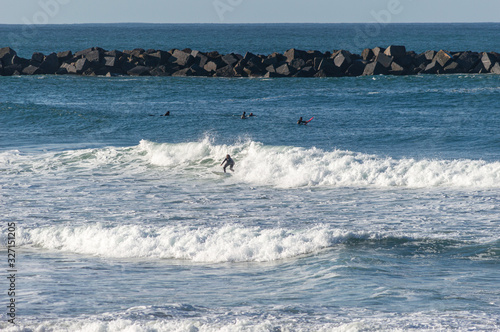 Photography Sport surfing on the beach of zurriola located in san sebastian spain