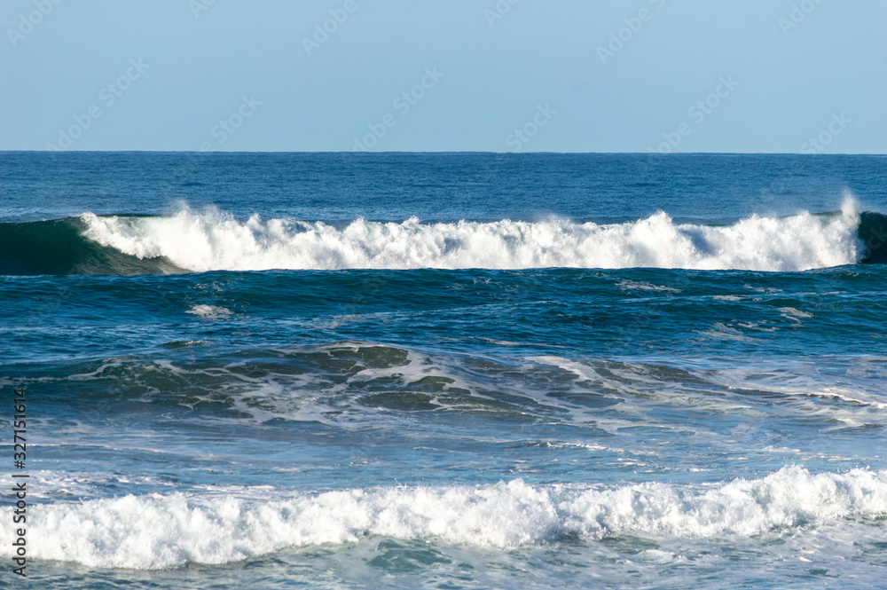 Sport surfing on the beach of zurriola located in san sebastian spain