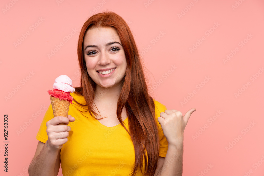 Young girl with a cornet ice cream over isolated background pointing to the side to present a product Young girl with a cornet ice cream over isolated background pointing to the side to present a product