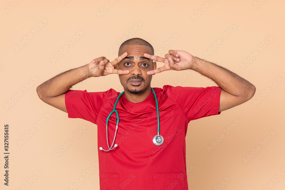African doctor wearing red uniform African doctor wearing red uniform