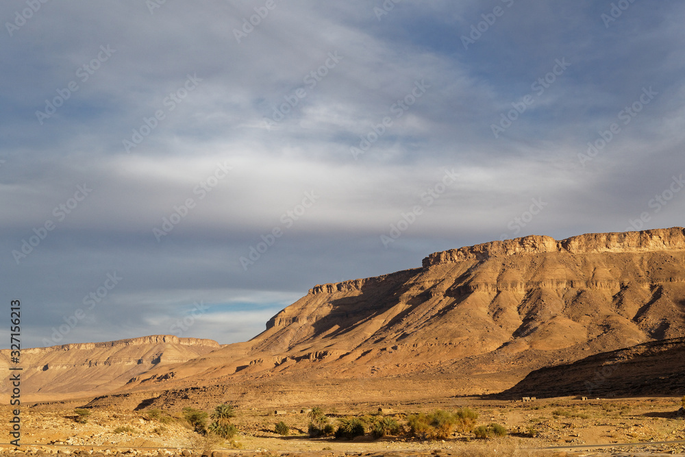 Desert landscape with blue cloudy sky in Mauritania. Adrar region.