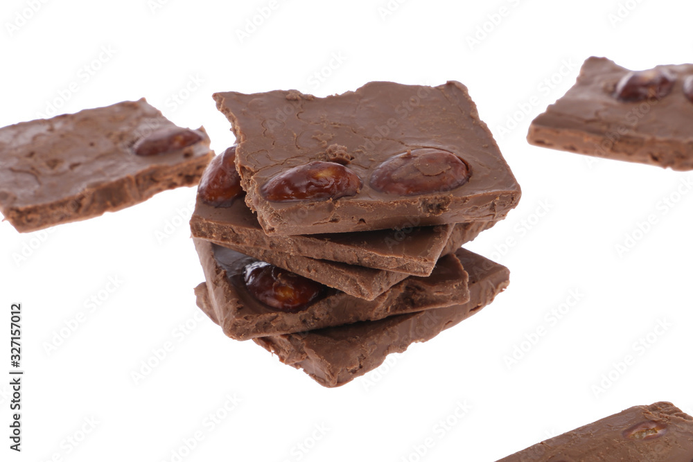 Dark chocolate pieces isolated on white background Dark chocolate pieces isolated on white background