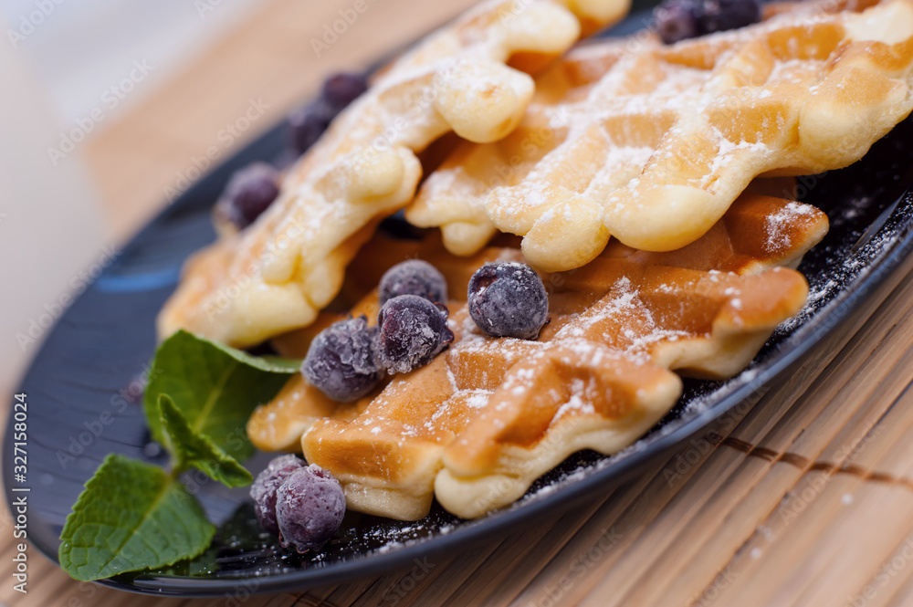 Belgian waffles with fresh berries and mint Belgian waffles with fresh berries and mint