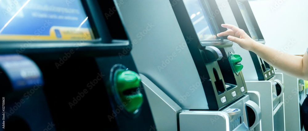 Fototapeta premium attractive asian woman hand touch screen atm business financial ideas concept