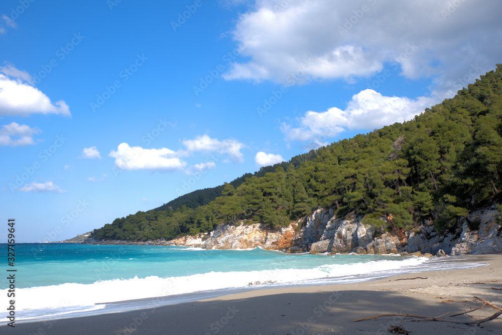 A beautiful beach on the island of Skopelos, Greece . her name is Kastani beach