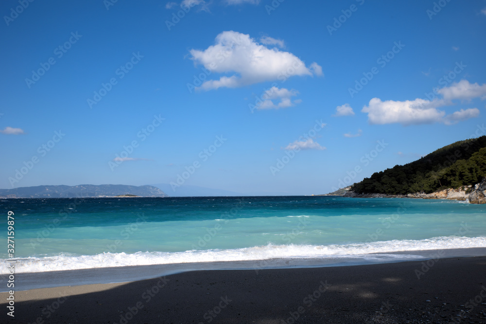 A beautiful beach on the island of Skopelos, Greece . her name is Kastani beach