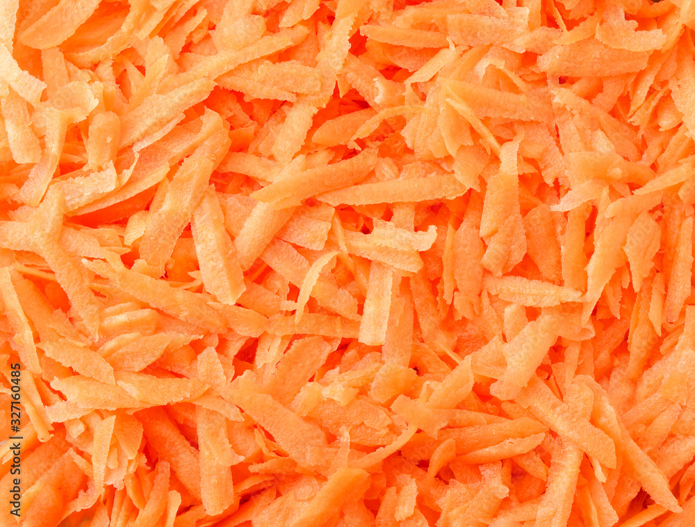 Grated carrot background. The view from the top Grated carrot background. The view from the top