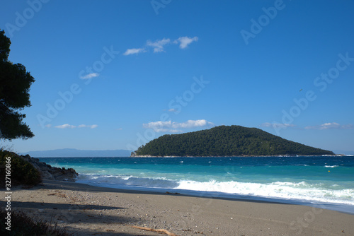 A beautiful beach on the island of Skopelos  Greece . her name is Kastani beach