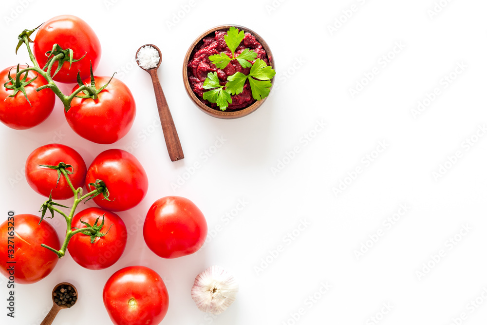 Tomato frame with suase and garlic on white background top-down copy space Tomato frame with suase and garlic on white background top-down copy space