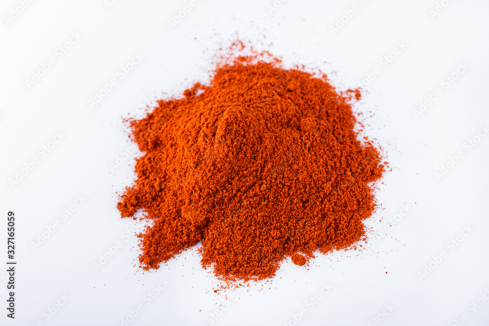 fragrant ground paprika on a white acrylic background