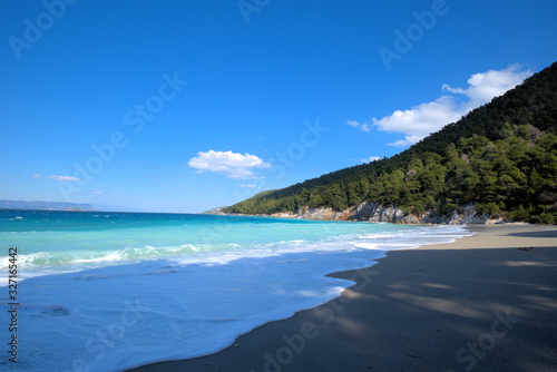 A beautiful beach on the island of Skopelos, Greece . her name is Kastani beach © ACHILLEFS